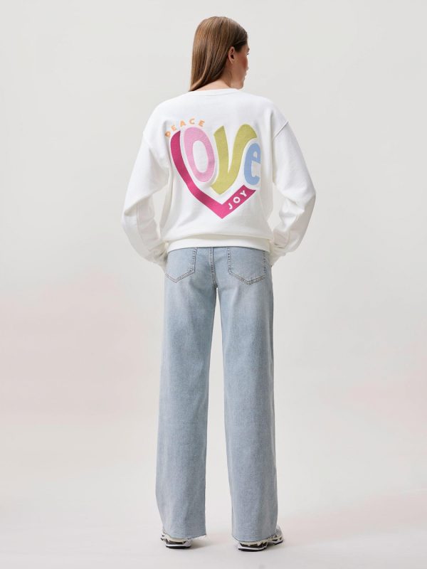 Catwalk Junkie Sweater power of love off white