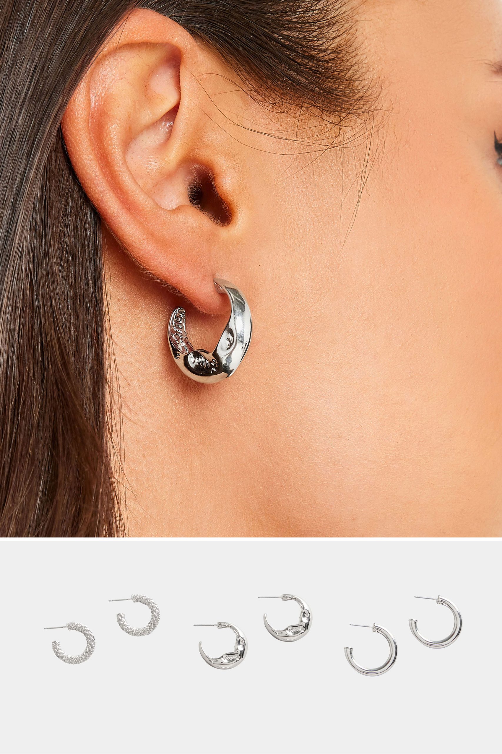 Set Van Drie Paar Oorringen Met Textuur In Zilver