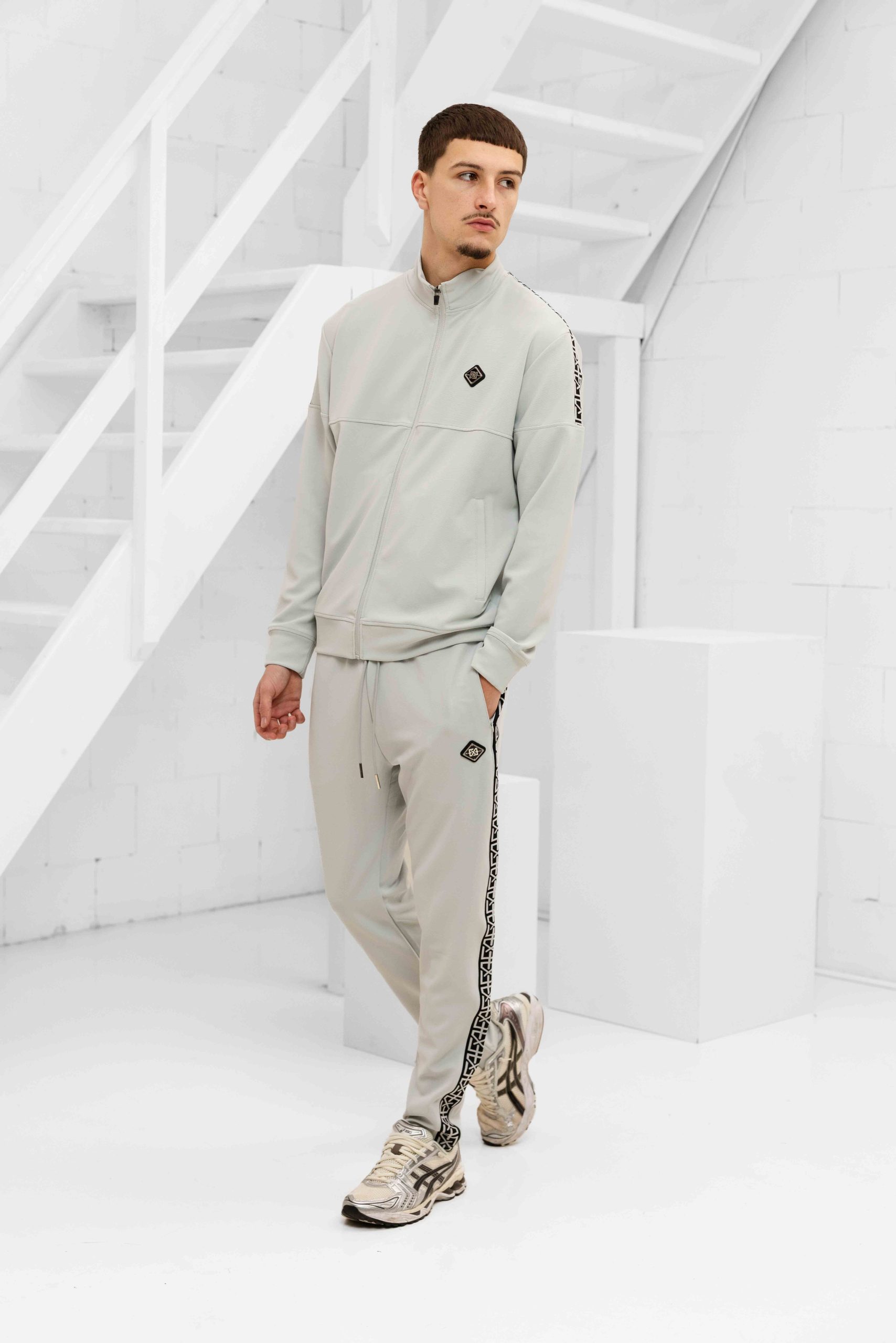 XPLCT Creator Trainingspak Heren Grijs - Maat S - Kleur: Lichtgrijs | Soccerfanshop