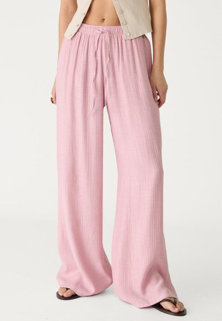 Stradivarius Soepelvallende lange broek met textuur  Pastelroze M