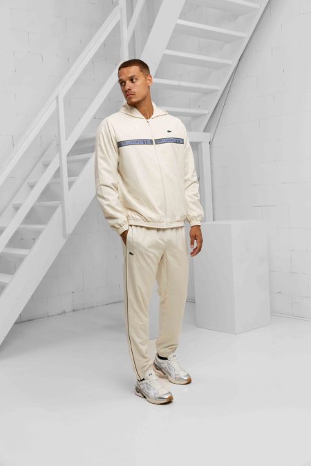 Lacoste Hooded Logostripe Trainingspak Heren Beige - Maat L - Kleur: BeigeDonkerblauwZwart | Soccerfanshop