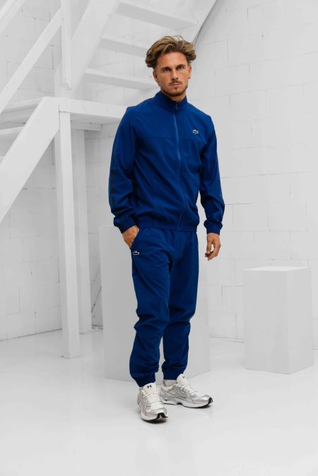 Lacoste Tennis x Novak Djokovic Trainingspak Heren Blauw - Maat S - Kleur: Blauw | Soccerfanshop