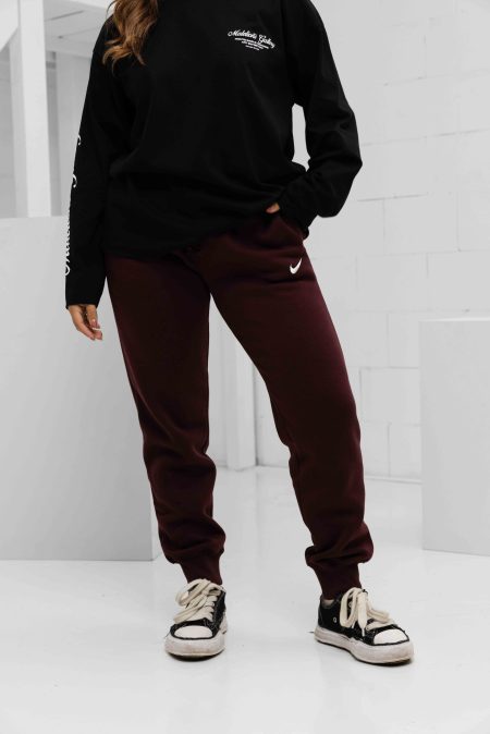 Nike Sportswear Phoenix Fleece Trainingsbroek Dames Donkerrood - Maat M - Kleur: Donkerrood | Soccerfanshop