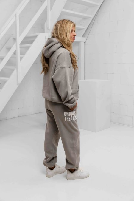 Unique The Label Elyana Trainingspak Dames Grijs - Maat XL - Kleur: Grijs | Soccerfanshop