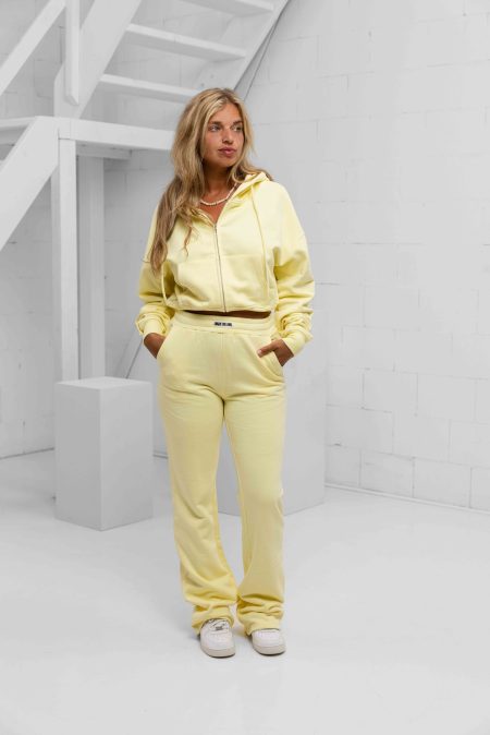 Unique The Label Molly Full Zip Trainingspak Dames Lichtgeel - Maat XS - Kleur: Lichtgeel | Soccerfanshop