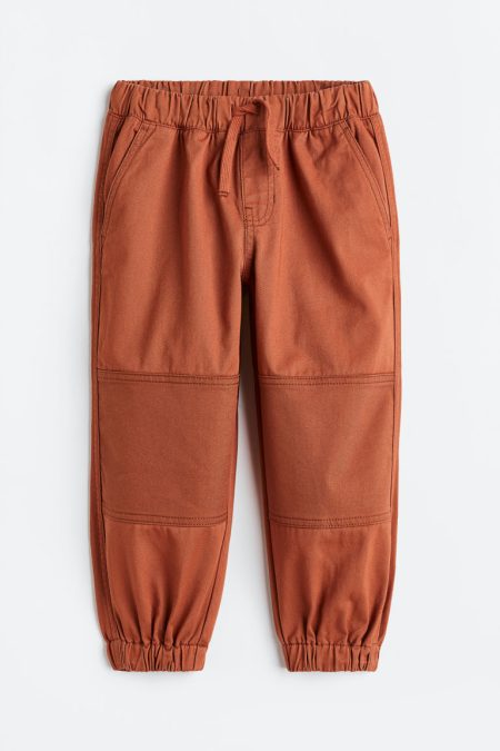 H & M - Joggers van katoenen twill - Loose Fit - Oranje