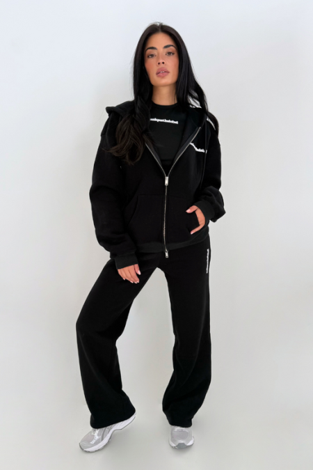 Unique The Label Imani Full Zip Trainingspak Dames Zwart - Maat XL - Kleur: Zwart | Soccerfanshop