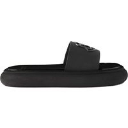 Moncler Sandalen - Cushioned Black Logo Slides With Relief Detail in zwart