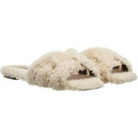 Saint Laurent Slippers - Tribute Flat Mules Shearling in beige