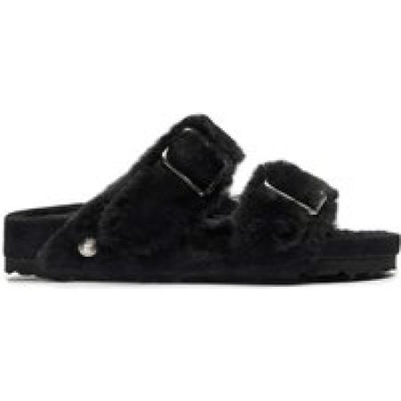 Birkenstock Sandalen - Black Shearling Sandals With Oversized Buckles in zwart
