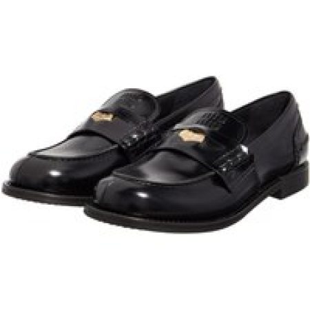 Miu Miu Loafers & ballerina schoenen - Classic Penny Loafer in zwart